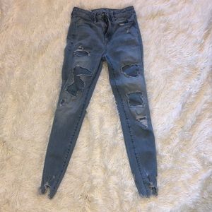 AEO light denim ripped/patched skinny jeans